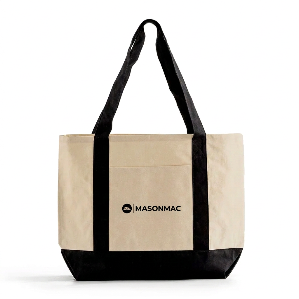 Natural and black MasonMac canvas tote with a small black logo on the front pocket.