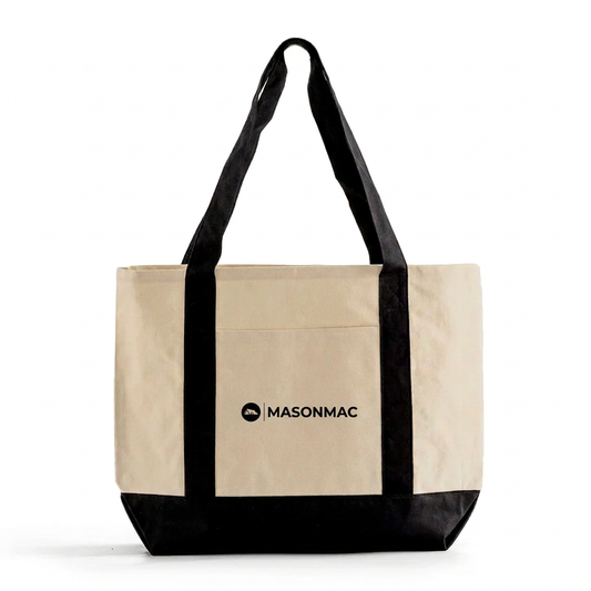 Natural and black MasonMac canvas tote with a small black logo on the front pocket.
